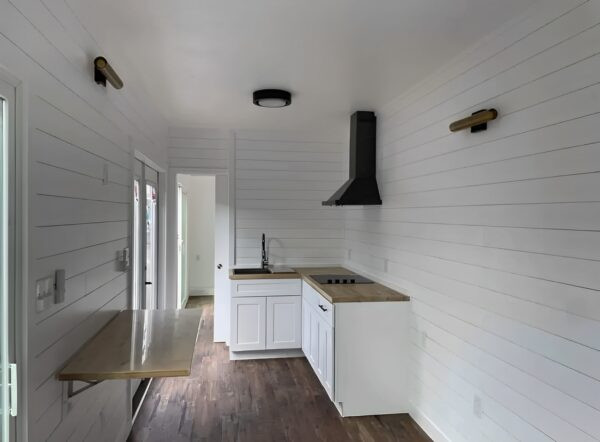Custom 40ft Luxury One-Bedroom Container Home — Door-end elevation and locking gear